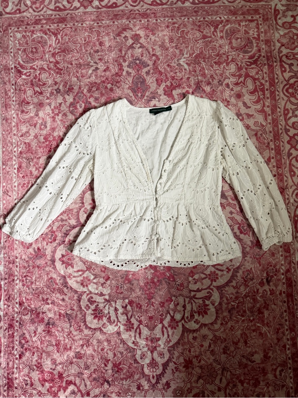White Eyelet Peplum Blouse with V-Neck and Button Front